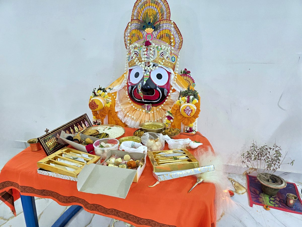 Lord Jagannath with bhog offering at Shri Radha Raman Temple, Puri